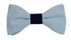 Nœud papillon raffiné dans une teinte apaisante de bleu ciel, accentué par un centre marine élégant. Une combinaison de couleurs harmonieuse qui évoque la sérénité et l'élégance.