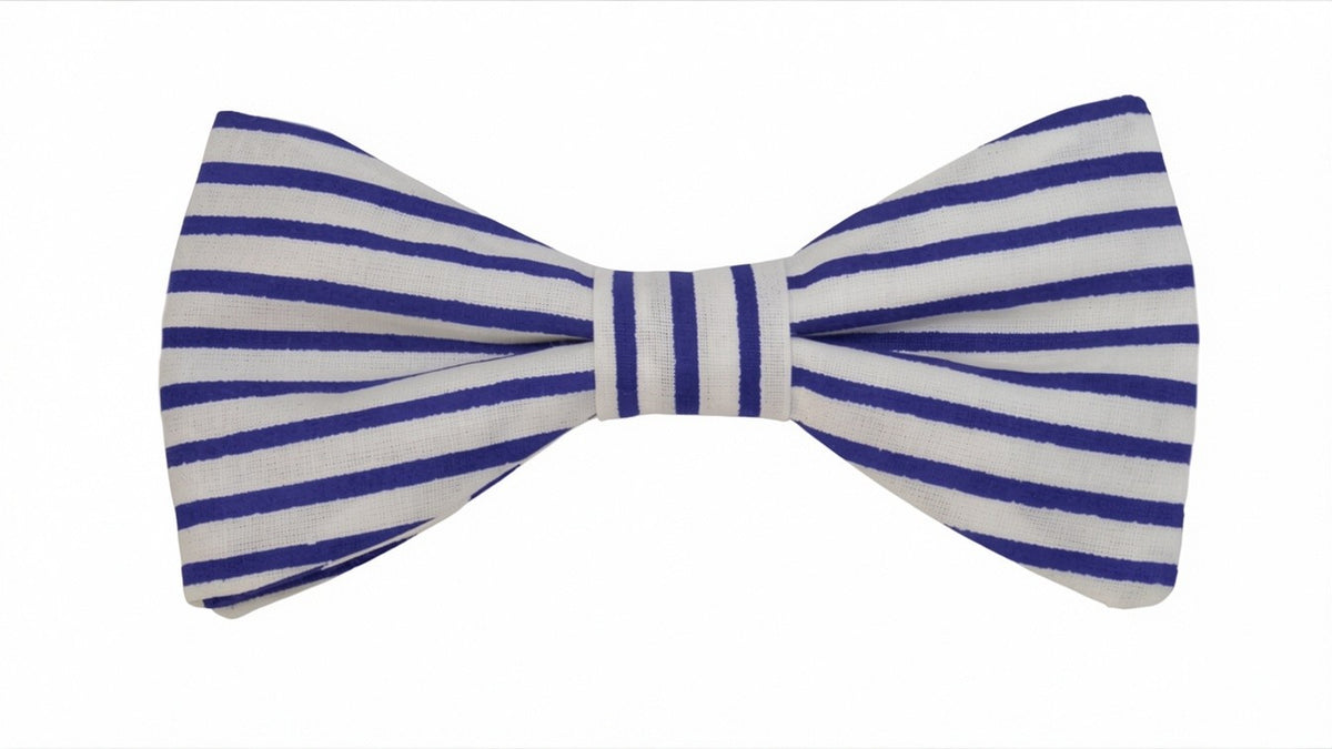 Nœud papillon rayé bleu nuit et blanc style marinière.