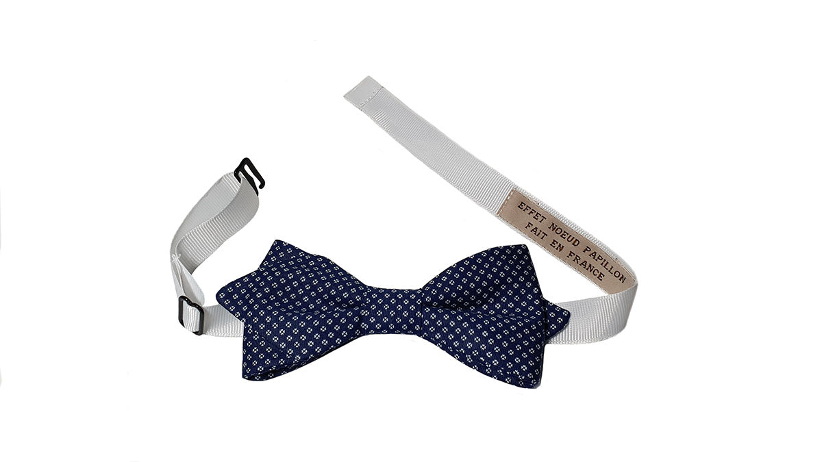 Noeud papillon bleu foncé motifs blancs